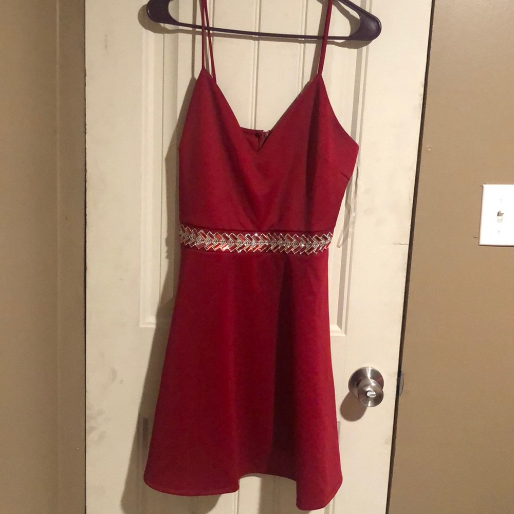 Red, loose fitting dress
